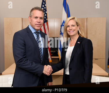 U.S. Homeland Security Secretary Kirstjen Nielsen and Israeli Minister of Public Security Gilad Erdan give brief remarks before their meeting at the U.S. Embassy in Jerusalem, June 11, 2018 Stock Photo