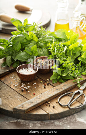 Cooking with fresh herbs Stock Photo