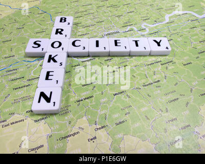 representation of broken society, a perceived or apparent general decline in moral values, with London map background Stock Photo