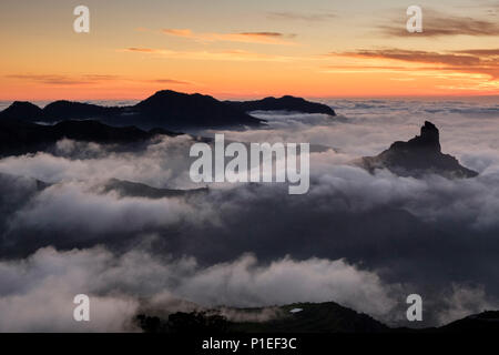 Roque Bentayga above the clouds at sunset, Gran Canaria, Canary Islands, Spain Stock Photo