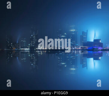 Night and fog in the rhine harbor of Rotterdam, South Holland, Netherlands Stock Photo