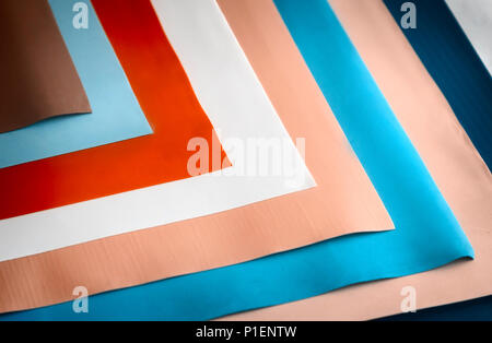 Multi-colored paper leaves for packaging and making various items: jewelry, flowers, toys. Stock Photo