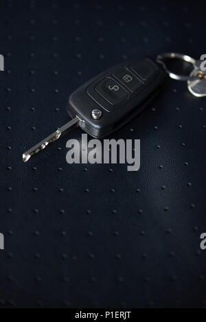 Modern car on leather seat background close up view Stock Photo