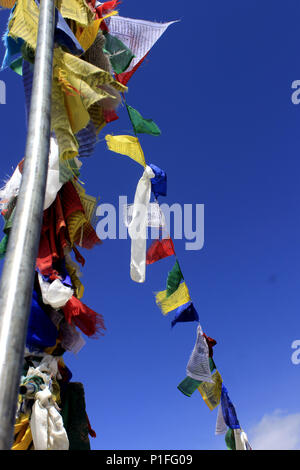 Sikh praying flags besides the Gurudongmar Lake. On the way to Gurudongmar lake. Stock Photo
