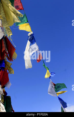 Sikh praying flags besides the Gurudongmar Lake. On the way to Gurudongmar lake. Stock Photo