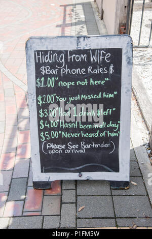 Picton,South Island,New Zealand-December 13,2016: Funny chalkboard sign outside Mikeys Bar in downtown Picton, New Zealand Stock Photo