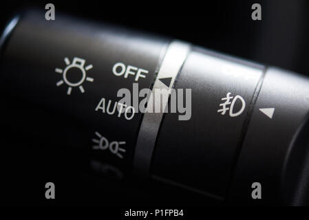 Changing headlight stick of modern car close-up. Car light control system Stock Photo