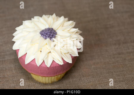 Cupcake iced with flower design Stock Photo