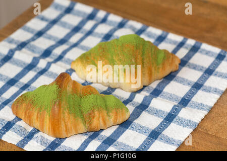 Fresh matcha croissants Stock Photo