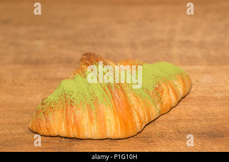 Fresh matcha croissant Stock Photo