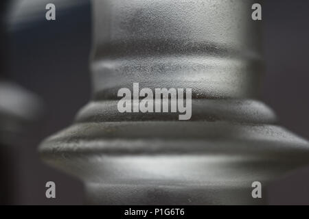 An abstract, macro photo of a frosted glass chess piece. Stock Photo