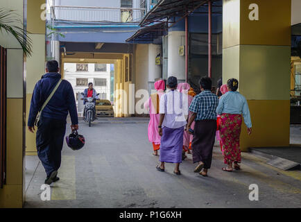 Mandalay, Myanmar - Feb 10, 2017. People walking at train station in Mandalay, Myanmar. Stock Photo