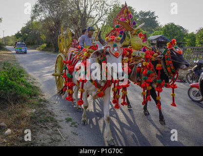 Mandalay, Myanmar - Feb 10, 2017. Burmese people at Shinbyu (pabbajja) ceremony of Theravada Buddhism in Mandalay, Myanmar. Stock Photo