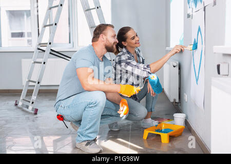 Loving couple doing renovations together Stock Photo