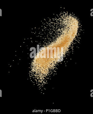 flying brown sugar isolated on black background Stock Photo