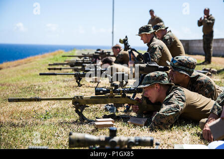 MARINE CORPS BASE HAWAII – KANEOHE BAY, Hawaii (October 16, 2016) – Marines with Maritime Raid Force, 11th Marine Expeditionary Unit, perform battle site zeroes on their M40A1 sniper rifles as part of a sustainment training exercise conducted on Marine Corps Base Kaneohe Bay, Oahu, Hawaii, October 16, 2016. The MRF training included combat marksmanship, close-quarters battle drills, and parachute operations familiarization. (U.S. Marine Corps photo by Lance Cpl. Devan K. Gowans/Released) Stock Photo