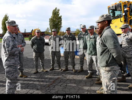 Col. Ryan Samuelson, 92nd Air Refueling Wing commander, thanks Airmen from the 92nd Civil Engineer Squadron at the end of the annual Snow Parade Oct. 14, 2016, Fairchild Air Force Base, Wash. Over a dozen varied heavy plows and dump trucks participated in the event. Stock Photo