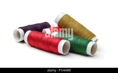 Multicolored threads isolated on white background Stock Photo
