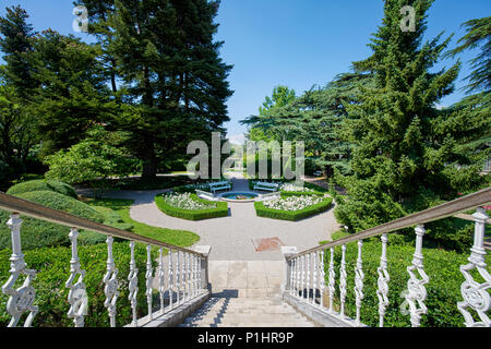 Botanical garden of Sežana, 19th century, Slovenia A 150-years old cedar, flowerbeds, blooming pergolas and the palmarium - garden of joy Stock Photo