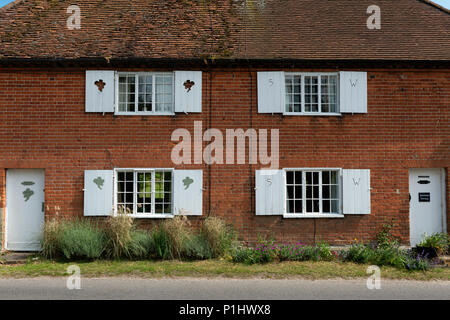 Semi-detached houses with wooden window shutters Stock Photo