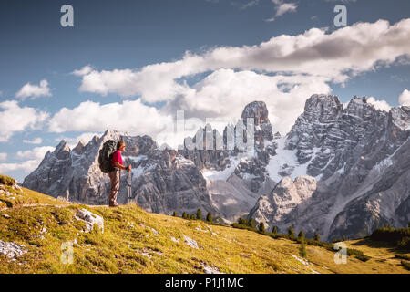 hiker in front of Alps mountains Stock Photo