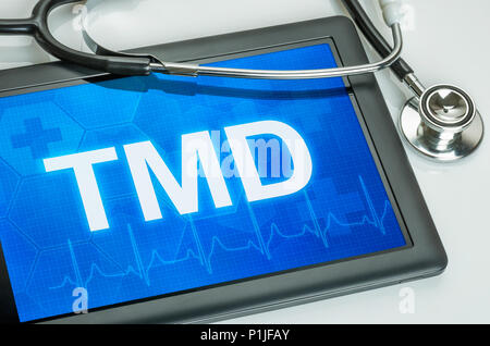Tablet with the text TMD on the display Stock Photo