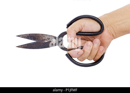 Old Rusty Scissors for tailor in hand isolated on white Stock Photo