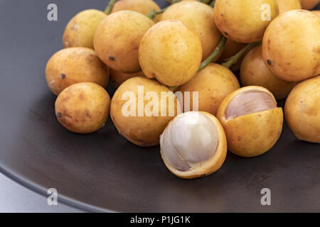 Burmese grape - Mafai in Thai, sweet and sour fruit (scientific name is Baccaurea ramiflora Lour) Stock Photo