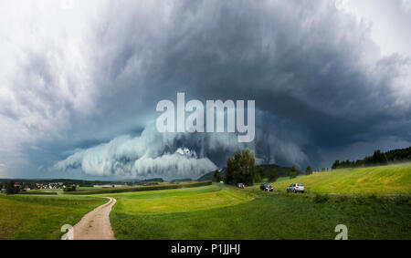 Panorama of a dramatic gust front of an outflow-dominant supercell near Hersbruck, Bavaria, Germany Stock Photo