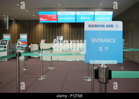 A Korean air airline desk in terminal 2 at Incheon International Airport sometimes referred to as Seoul–Incheon International Airport the largest airport in South Korea located west of the city of Incheon Stock Photo