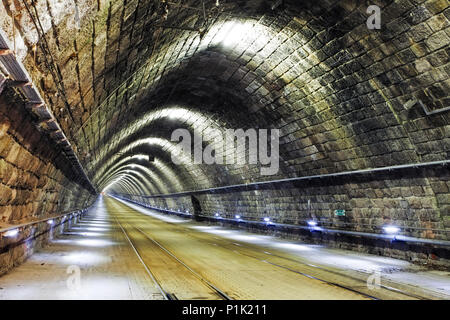 Train tunnel with railroad and a lights Stock Photo