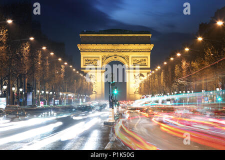 Arc De Triomphe and light trails, Paris Stock Photo