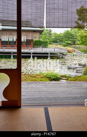 Tea house and water lilies at Shirotori - traditional Japanese garden in Nagoya. View from inside. Stock Photo