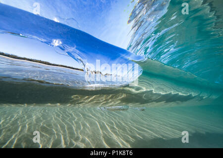 Underwater view of a wave breaking in ocean, Queensland, Australia Stock Photo