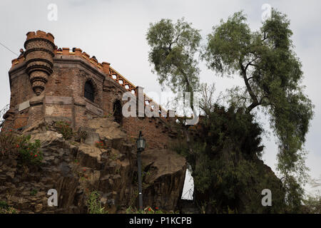 A tourist takes in the view of Santiago, Chile, from the highest point of the Santa Lucia Battery. Stock Photo