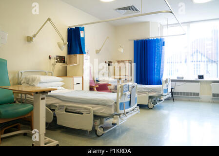 Empty hospital beds awaiting patients on the re-enablement ward at Clacton Hospital. Stock Photo