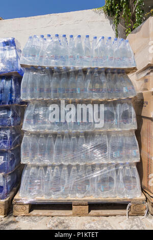 Crates of plastic water bottles in Greece Stock Photo