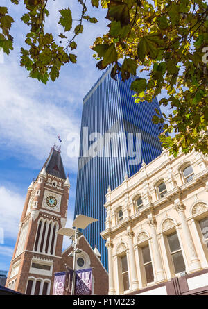 The David Malcolm Justice Centre towers over Perth Town Hall and heritage buildings in the centre of Perth, Western Australia, Australia Stock Photo