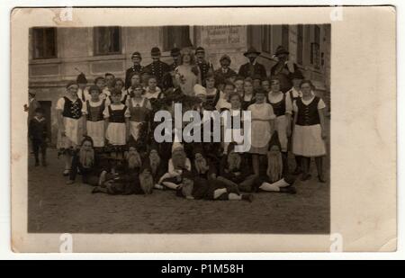 GERMANY - CIRCA 1930s: Vintage photo shows people (amateur actors) wear theatre costums. Some boys wear dwarfs costume. Stock Photo