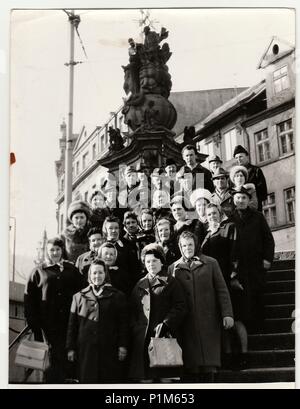 KARLOVY VARY, THE CZECHOSLOVAK SOCIALIST REPUBLIC - CIRCA 1970s: Retro photo shows people pose at the spa resort. Black & white vintage photography. Stock Photo