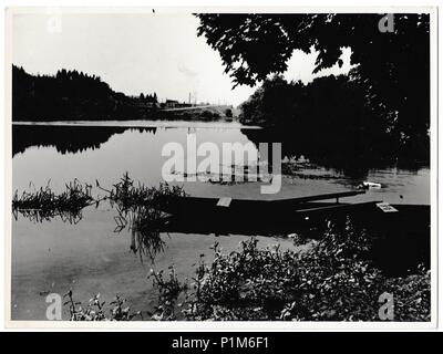 THE CZECHOSLOVAK SOCIALIST REPUBLIC - CIRCA 1960s: Retro photo shows view on the lake. Black & white vintage photography Stock Photo