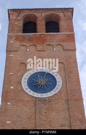 Close up on the sundial and clock face of the bell tower in Chioggia, Venice, Italy Stock Photo