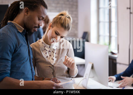 Portrait of architects having discussion in office Stock Photo