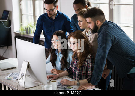 Young architects working on project in office Stock Photo