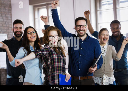 Portrait of successful business team posing in office Stock Photo