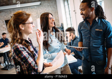 Portrait of architects having discussion in office Stock Photo