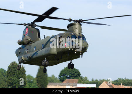 Boeing CH47 Chinook military transport helicopter of the Royal Air Force coming in to land Stock Photo