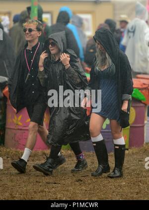 Revelers enjoy the rain at Glastonbury Festival 2015 - Friday Stock Photo
