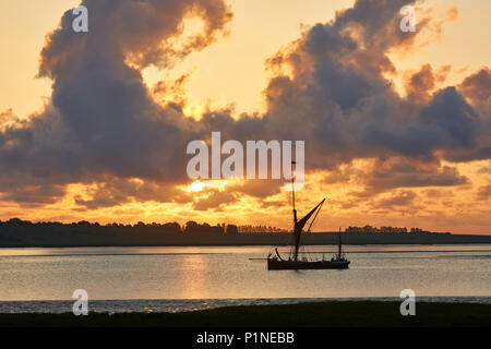 Swale Estuary, Kent, UK. 13th June 2018: UK Weather. Sunrise over the Thames sailing barge Mirosa which is over 125 years old having been built in 1892.  Perfect sailing conditions of warm, dry and breezy weather are set for the next few days. Credit: Alan Payton/Alamy Live News Stock Photo