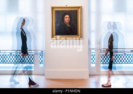 London, UK.  13 June 2018. Staff members walk by 'Self-Portrait of Giorgione', 1792, by Antonio Canova,  (est. £1m).  More known as the sculptor of V&A's 'The Three Graces', Canova's rediscovered painting, was made to fool fellow Roman artists into believing that it was an original self-portrait by Giorgione.  It is on public view for the first time since being painted at M&L Fine Art gallery, Old Bond Street, during London Art Week, with 40 galleries St James's and Mayfair taking part, 28 June to 6 July 2018.  Credit: Stephen Chung / Alamy Live News Stock Photo
